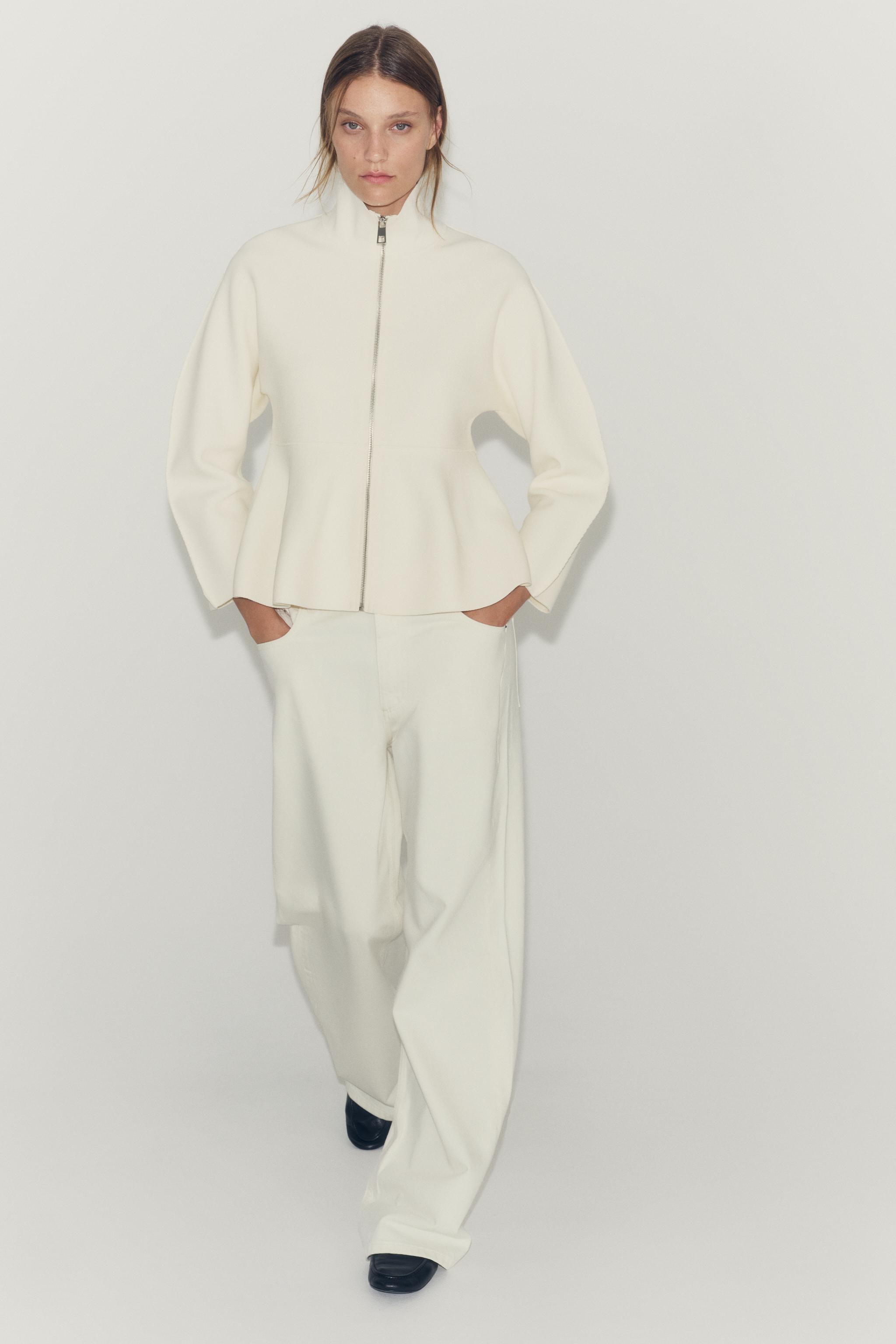 GILET EN MAILLE PEPLUM ZIPPÉ